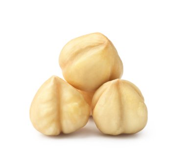 Pile of peeled hazelnuts on a white background