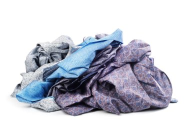 Pile of shirts isolated on white background clipart