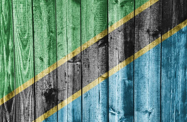 Bandeira da Tanzânia sobre madeira intemperizada — Fotografia de Stock