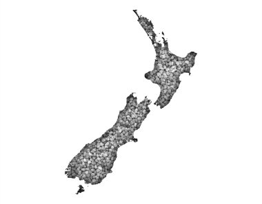 Yeni Zelanda Haritası üzerinde haşhaş tohumu,