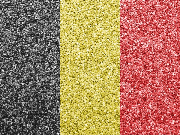 Bandera de Bélgica sobre semillas de amapola — Foto de Stock
