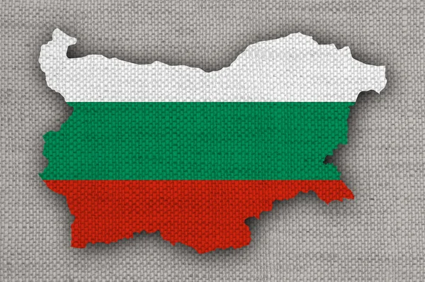 Karte und Flagge Bulgariens auf altem Leinen — Stockfoto