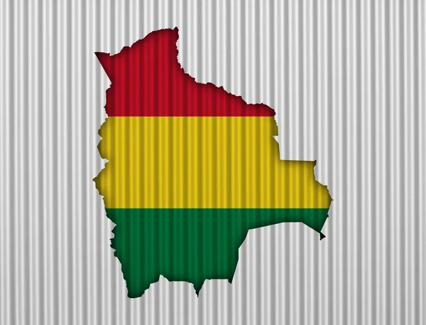 Kaart en vlag van Bolivia op golfplaten — Stockfoto