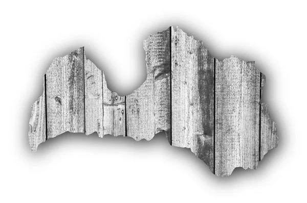 Map of Latvia on weathered wood — Stock Photo, Image