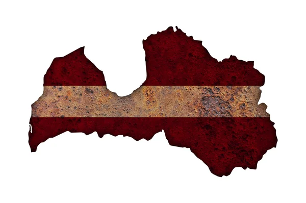 Map and flag of Latvia on rusty metal — Stock Photo, Image