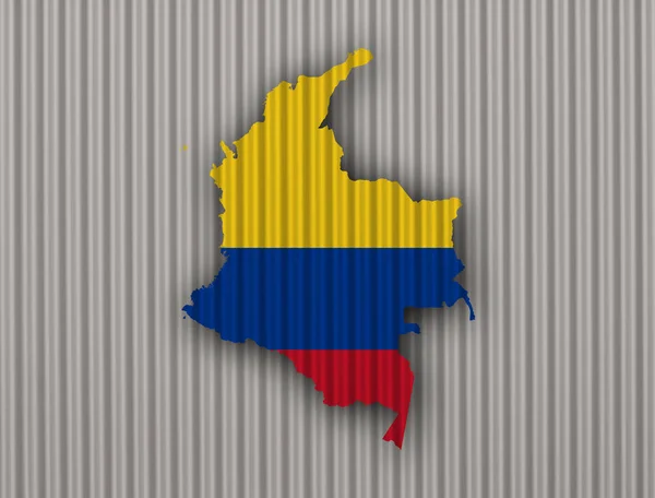 Mapa y bandera de Colombia sobre hierro ondulado —  Fotos de Stock