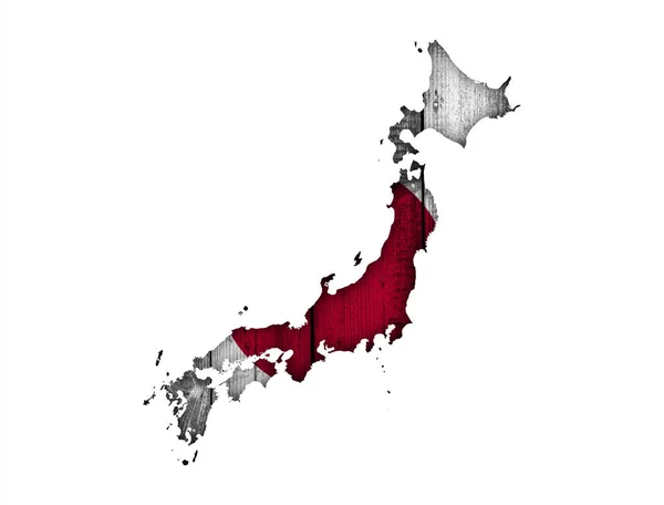 Mapa e bandeira do Japão em madeira intemperizada — Fotografia de Stock