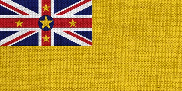 Bandiera di Niue sulla vecchia biancheria — Foto Stock