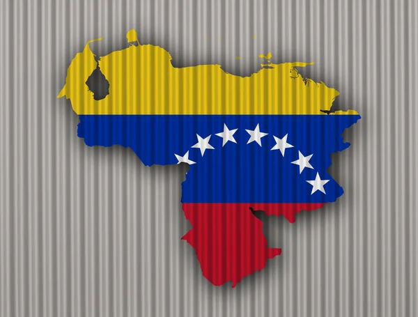 Χάρτης και σημαία της Βενεζουέλας σε κυματοειδές σιδήρου — Φωτογραφία Αρχείου