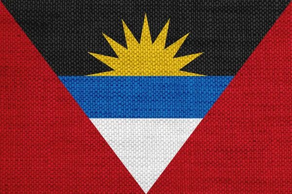 Vlag van Antigua en Barbuda op oude linnen — Stockfoto