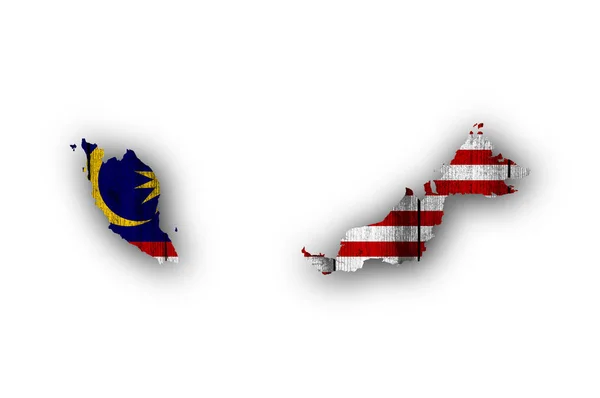 地図と風化した木材にマレーシアの旗 — ストック写真