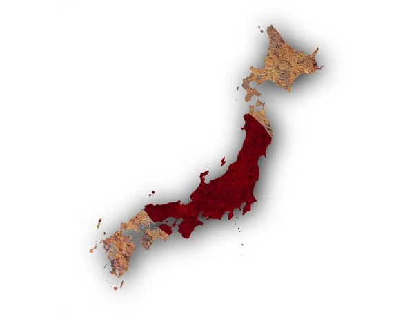 Kaart en de vlag van Japan op roestig metaal — Stockfoto