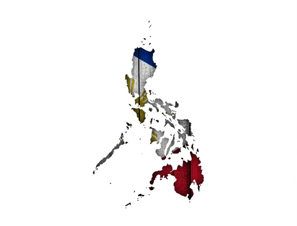 Peta dan bendera Filipina pada kayu lapuk — Stok Foto