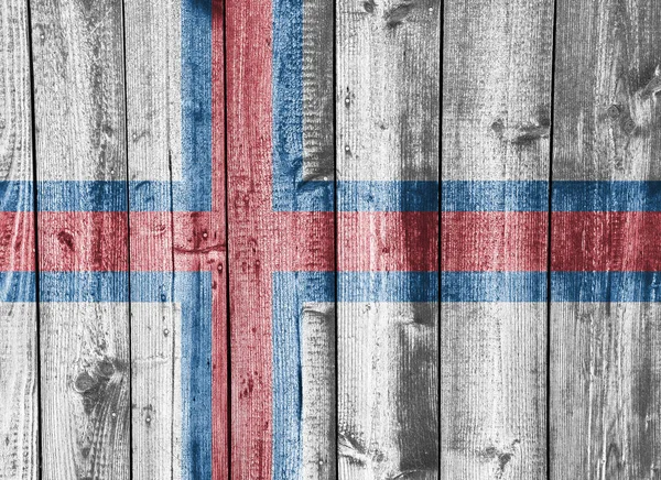 Flag of Faroe Islands on weathered wood — Stock Photo, Image