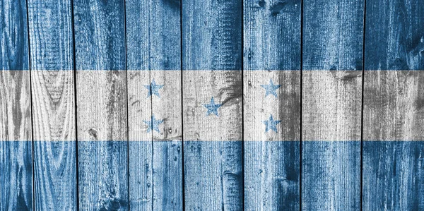 Flag of Honduras on weathered wood — Stock Photo, Image