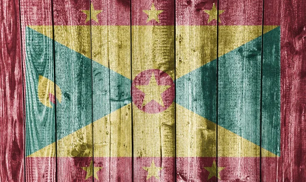 Flag of Grenada on weathered wood — Stock Photo, Image