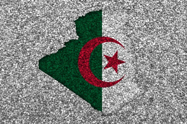 Mapa y bandera de Argelia sobre semillas de amapola — Foto de Stock
