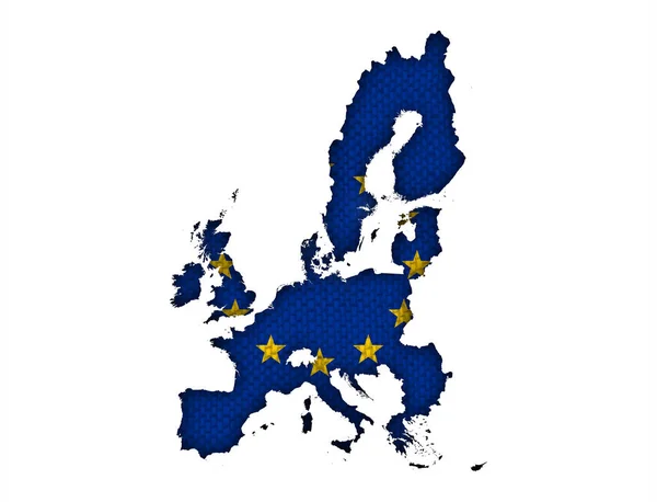 Mapa y bandera de la UE sobre ropa de cama vieja — Foto de Stock