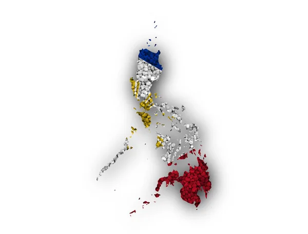 Mapa y bandera de Filipinas sobre semillas de amapola —  Fotos de Stock