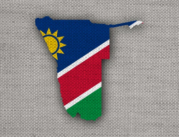 Harita ve eski keten üzerinde Namibya Cumhuriyeti bayrağı — Stok fotoğraf