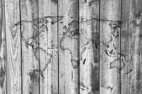 Map of the world on weathered wood — Stock Photo, Image