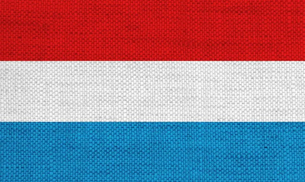Bandeira do Luxemburgo em linho velho — Fotografia de Stock