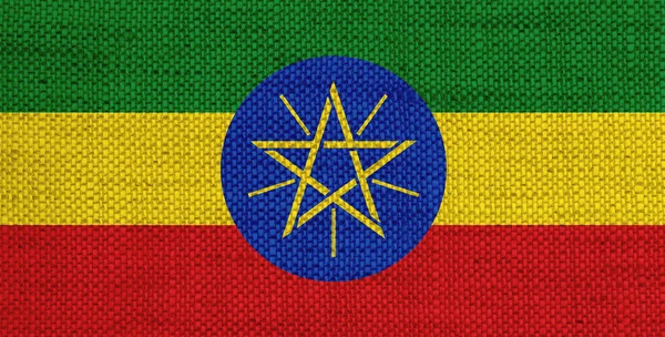 Flag of Ethiopia on old linen — Stock Photo, Image