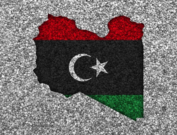 Mappa e bandiera della Libia su semi di papavero — Foto Stock