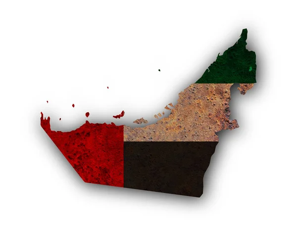 Mapa y bandera de Emiratos Árabes Unidos sobre metal oxidado —  Fotos de Stock