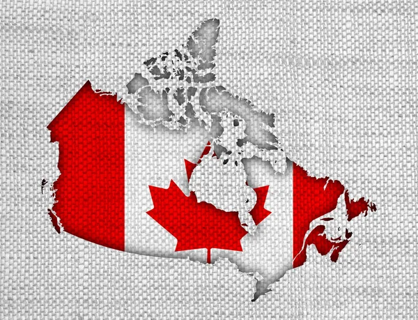 Mapa y Bandera de Canada en lino viejo —  Fotos de Stock