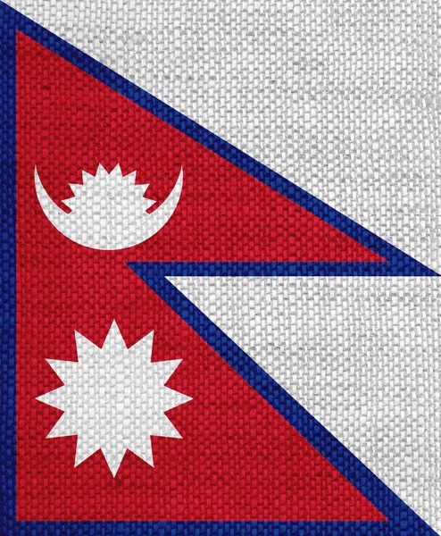 Flag of Nepal on old linen — Stock Photo, Image