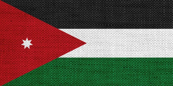 Flagge von Jordanien auf altem Leinen — Stockfoto