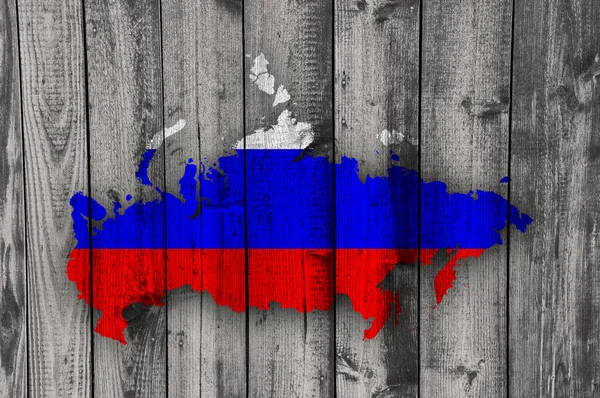 Map and flag of Russia on weathered wood — Stock Photo, Image