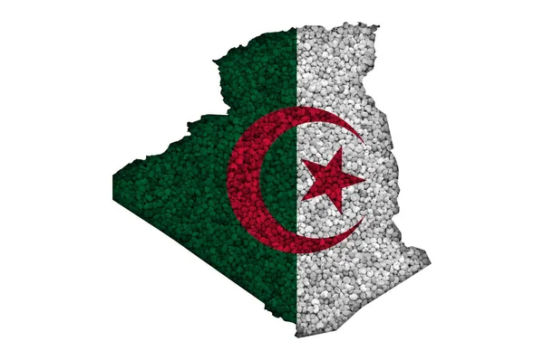 Mapa y bandera de Argelia sobre semillas de amapola —  Fotos de Stock