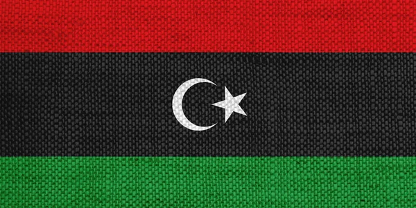 오래 된 리넨에 리비아의 국기 — 스톡 사진