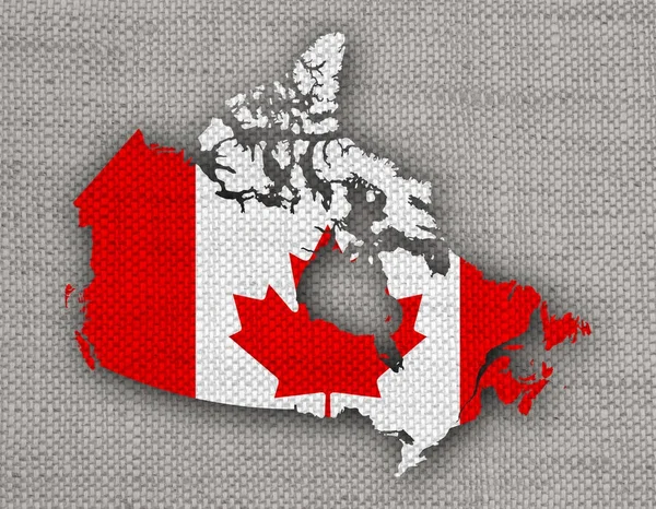 Mapa e bandeira do Canadá em linho velho — Fotografia de Stock