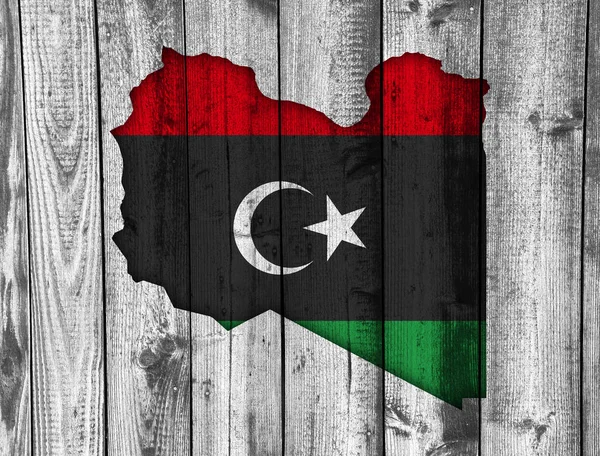 Kaart en vlag van Libië op verweerd hout — Stockfoto