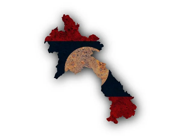 Mapa y bandera de Laos sobre metal oxidado — Foto de Stock