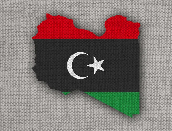Karta och flaggan i Libyen på gamla linne — Stockfoto