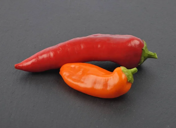 Ball pepper on slate — Stock Photo, Image