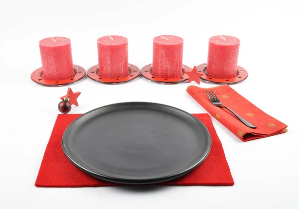 Christmassy table setting with felt and candles — Stock Photo, Image