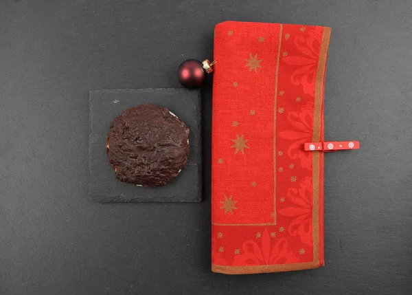 German Lebkuchen with christmas napkin on slate — Stock Photo, Image