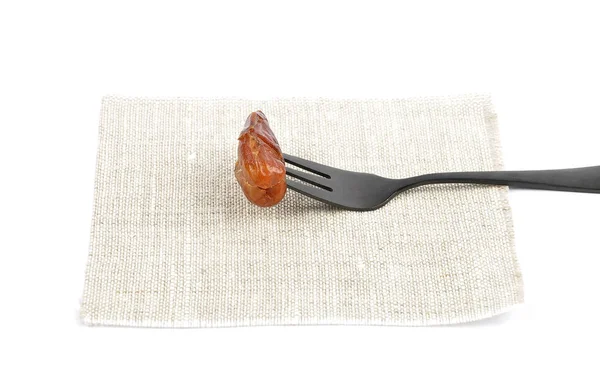 Date on fork and linen cloth — Stock Photo, Image
