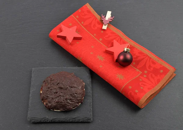 German Lebkuchen with christmas napkin on slate — Stock Photo, Image