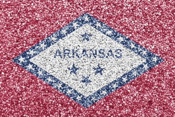 Arkansas flagga på vallmofrön — Stockfoto