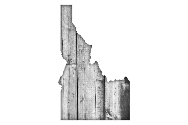 Map of Idaho on weathered wood — Stock Photo, Image