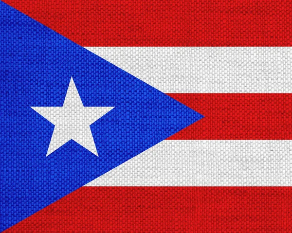 Flag of Puerto Rico on old linen — Stock Photo, Image