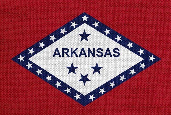 Bandera de Arkansas sobre lino viejo — Foto de Stock