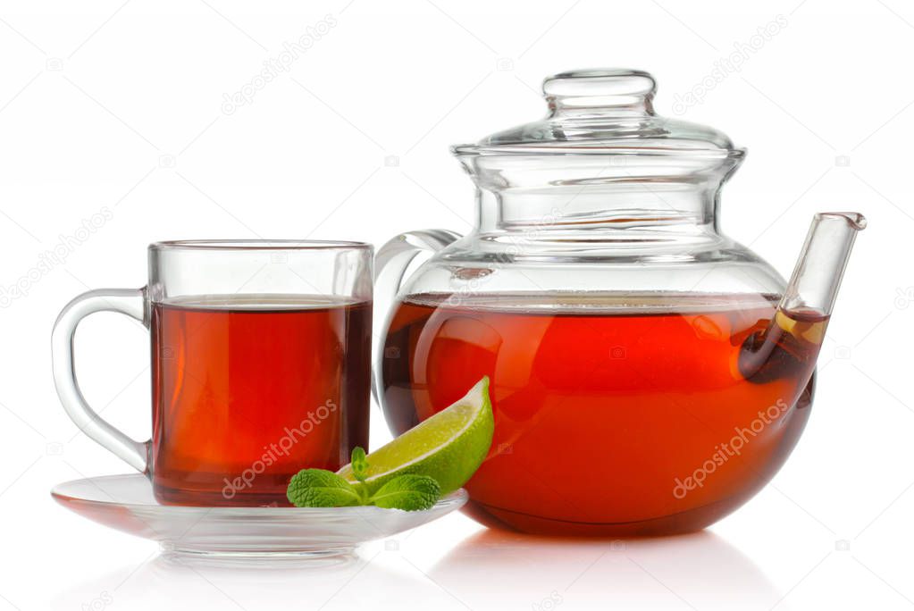 Tea cup, teapot with fresh mint and lime isolated