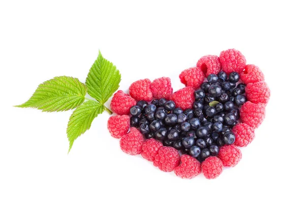 Heart of raspberries and blueberries — Stock Photo, Image